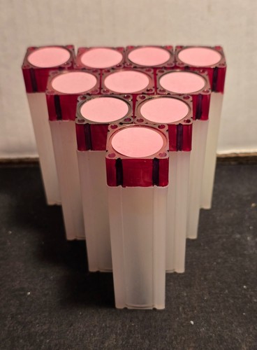 Pre-owned decorated Set of 10 Numis Square Plastic Coin Tubes for U.S. pennies.