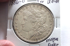 1886-O   KEY DATE    BREAST FEATHERS UNC+++  MORGA SILVER  DOLLAR