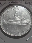 1953 Silver Dollar NSF Canada UNC.  Major Die Breaks Error-BB128