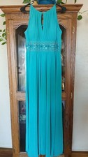Long, sleeveless, formal gown in turquoise blue size 12
