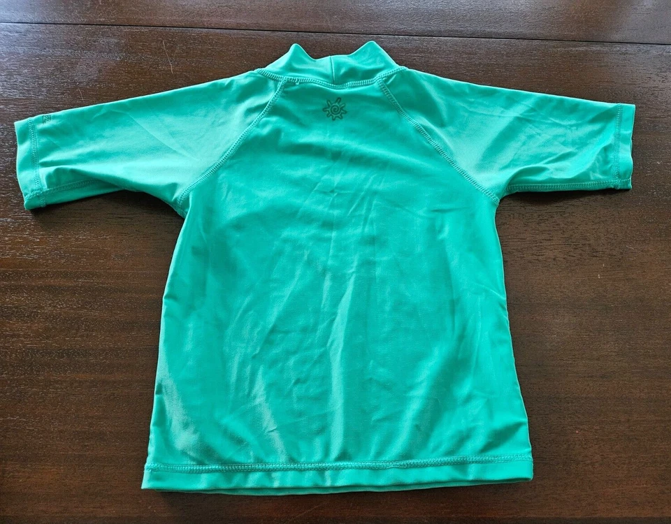 Camisa UV SKINZ verde manga corta UV protección contra erupciones talla 7 Foto 2 de 4