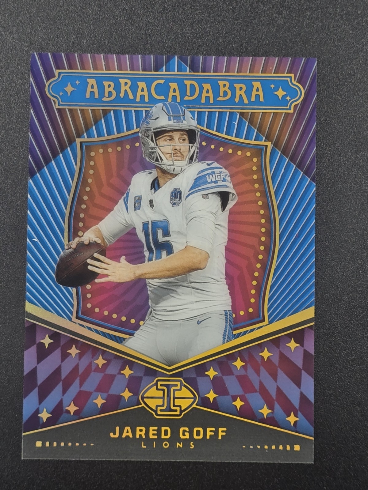 2024 Panini Illusions Jared Goff Abracadabra Blue Prizm Parallel /299 #7 Lions