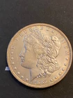 1885 O morgan silver dollar AU