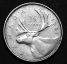 1961 25¢ silver coin in a paper flip