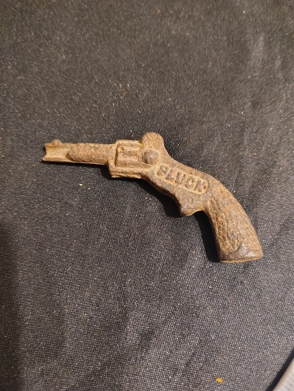Vintage Antique Pluck cast iron miniature toy cap gun JE Stevens 1908