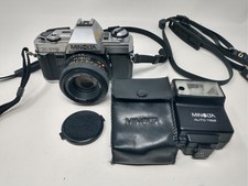 Minolta X-370 35mm SLR Camera w/ 50mm 1:1.7 Lens, Auto 118X Flash, 2 Straps, Cap