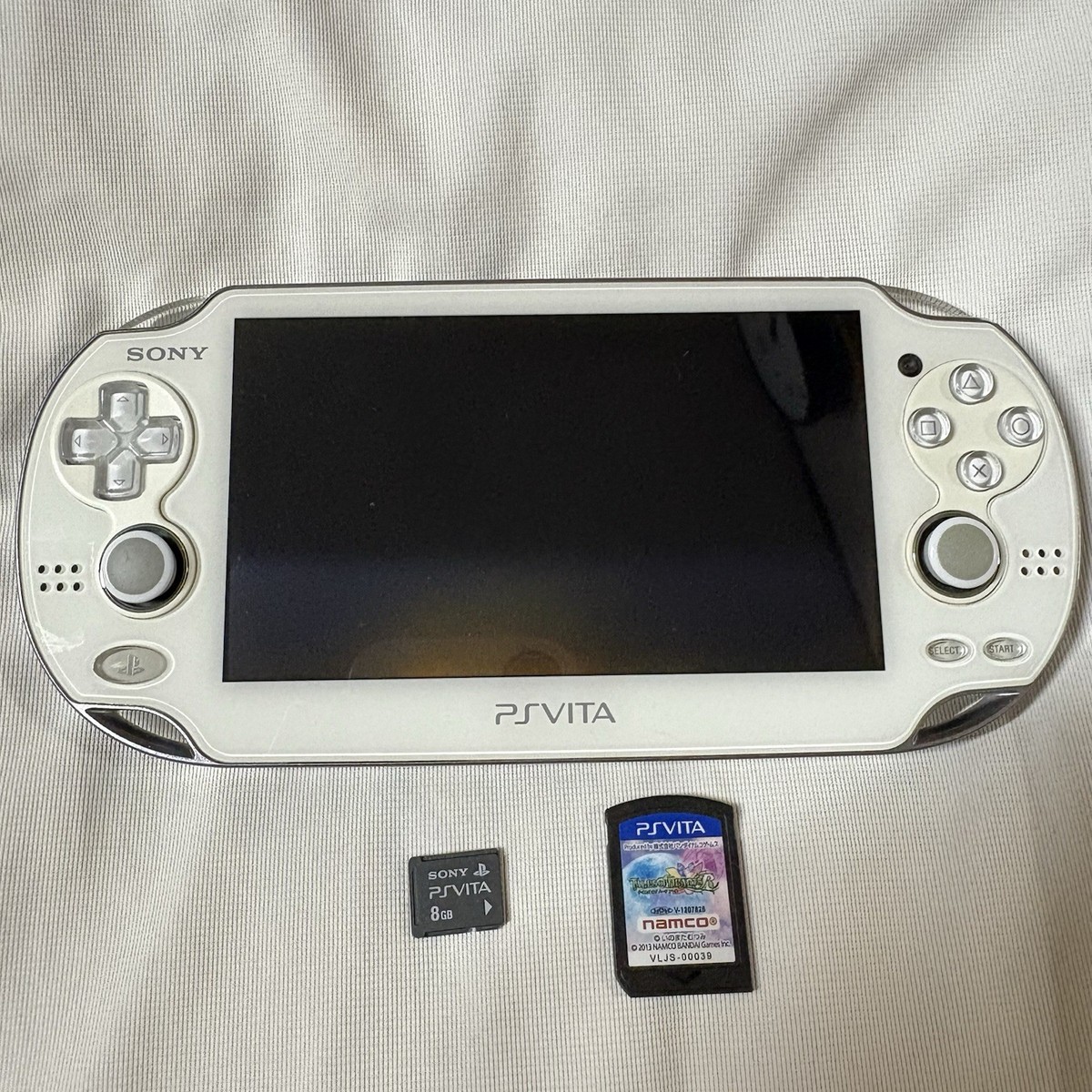 SONY - PS VITA PCH-1100 メモリ8GB SONY PS Vita PCH-1100 Crystal white w/one game and 8GB