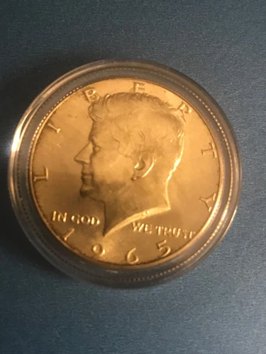 1965 Kennedy 40% Silver Half Dollar  BU in capsule