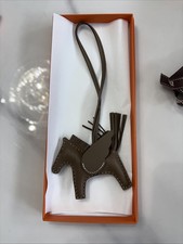 NIB Hermes P gase Pegasus Rodeo Charm PM in Etoupe Milo Lambskin K Stamp