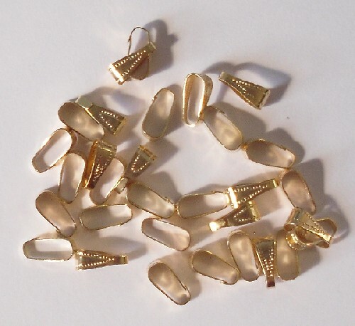 Fianzas de resorte chapadas en oro de 50 x 10 mm, hallazgos para joyería artesanal - Imagen 1 de 1