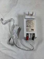 Power Supply  Model: SW-120100 AC Adapter  12.0V-1000mA