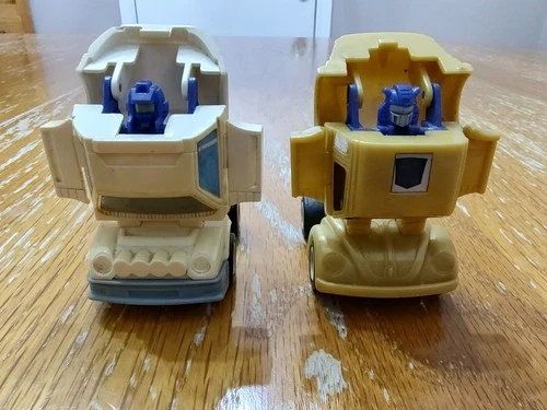 Transformers Throttlebots Goldbug and Searchlight Hasbro 1986