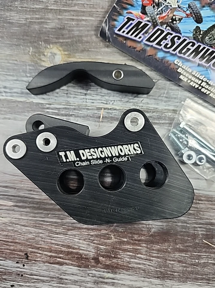 Guía de cadena y almohadilla de marco Powerlip TM Designworks KTM-200-BK KTM 125-525 2005 Foto 2 de 4