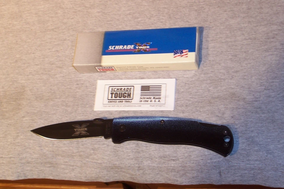 CUCHILLO TRASERO SCHRADE X TIMER 60TXB BLOQUEO NUEVO EN CAJA HOJA NEGRA MANGO NEGRO HECHO EN EE. UU. Foto 3 de 4