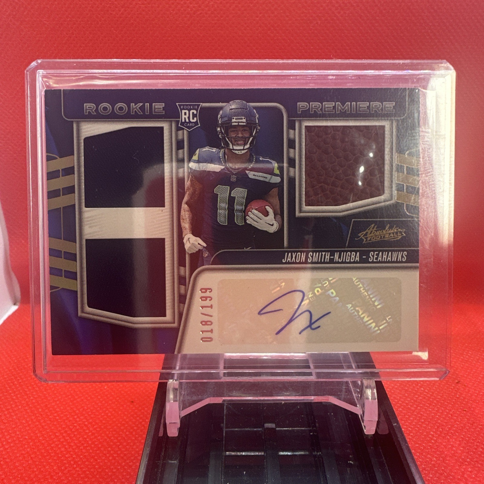 Jaxon Smith-Njigba Panini Absolute Rookie Premiere Materials Autographs #RPMJSN Spectrum