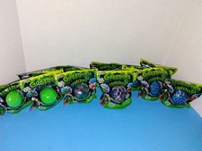 12 Ea Goozooka Squeezers Stress Ball 4-Blue W/Net, 4-green, 4-Multi  