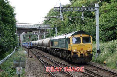 PHOTO  CLASS 66 66606  PASSES READING WEST WORKING 6M91 THEALE LAFARGE TO HOPE E