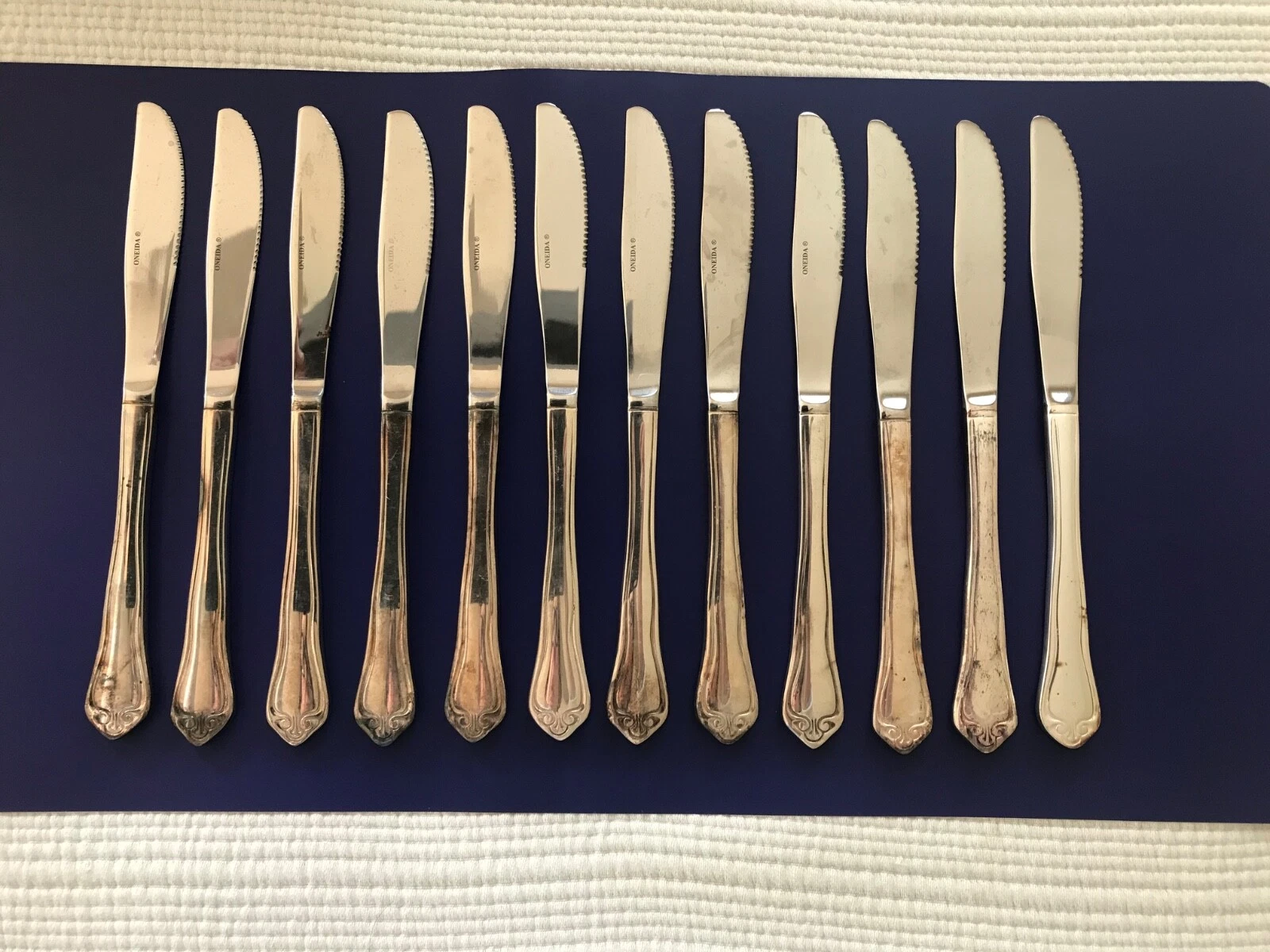12 Oneida Community CROYDON Serrated Silver Plate Satin Knives *Never Used*