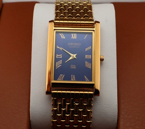 Vintage Seiko Slim Quartz Men's Wrist Watch Blue Dial with Gold Bracelet .