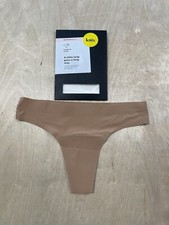 Knix Women's Light Absorbency Leakproof Thong Size Small Beige