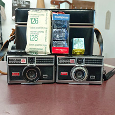 Kodak Instamatic 404  304 126 film cameras lot w/ case, flash cubes, meter