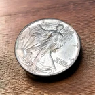 1986 RARE SILVER EAGLE- FIRST YEAR  YOU NEVER FORGET THE FIRST ONE DO YA?