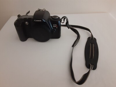 Canon EOS Rebel XS Digital Camera BODY ONLY- PARTS + Shoulder Strap + Booklet