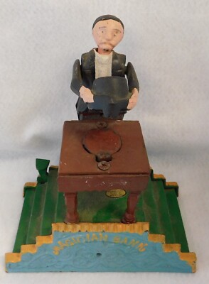 Magician Vintage Cast Iron Metal Mechanical Coin Bank - AA Importing Co