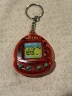 Tiger Giga Pets Baby T-Rex Virtual Pet Digital Keychain Toy — photo 3
