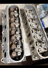 Set Of Aluminum Gm 706 Ls Cylinder Heads That Need To Be Rebuilt. Set Of Aluminum Gm 706 Ls Cylinder Heads That Need To Be Rebuilt.