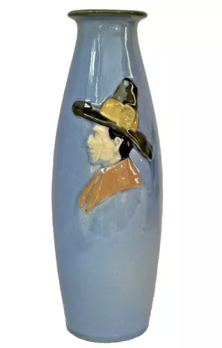 WELLER POTTERY DICKENSWARE VASE W/ EMBOSSED MAN WITH HAT CA.1910..SIGNED & MINT!