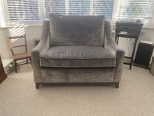 Luxury sofa bed with grey velvet upholstery 