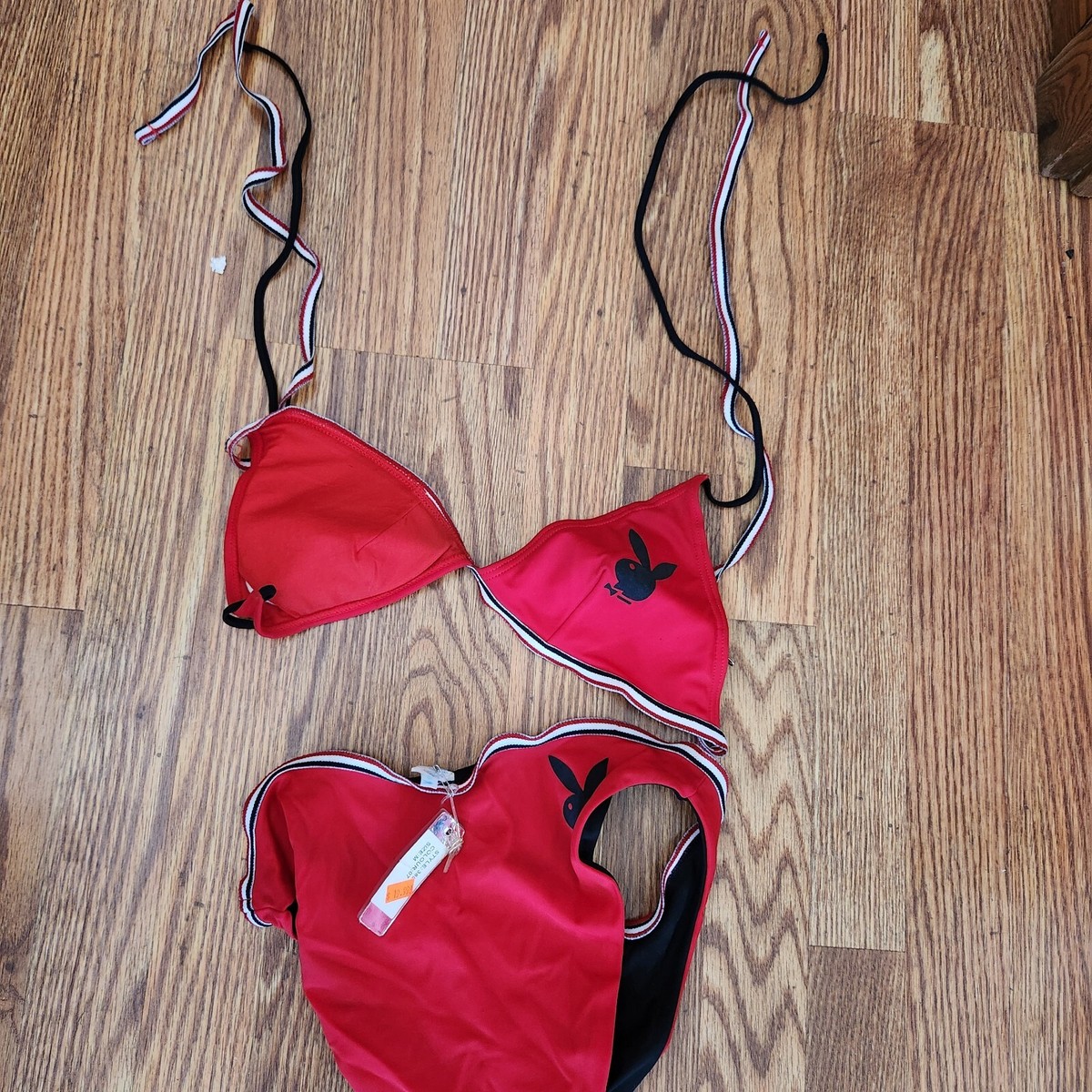 red bikini top with black bottoms