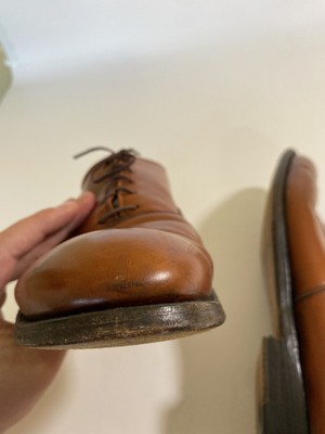 Alden 931 Plain Toe Bal is built on the Aberdeen last. The model has a black Calfskin leather upper with a single leather outsole.
