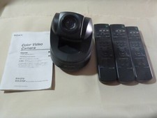 Sony video camera model EVI-D70 with 3 remove controllers.