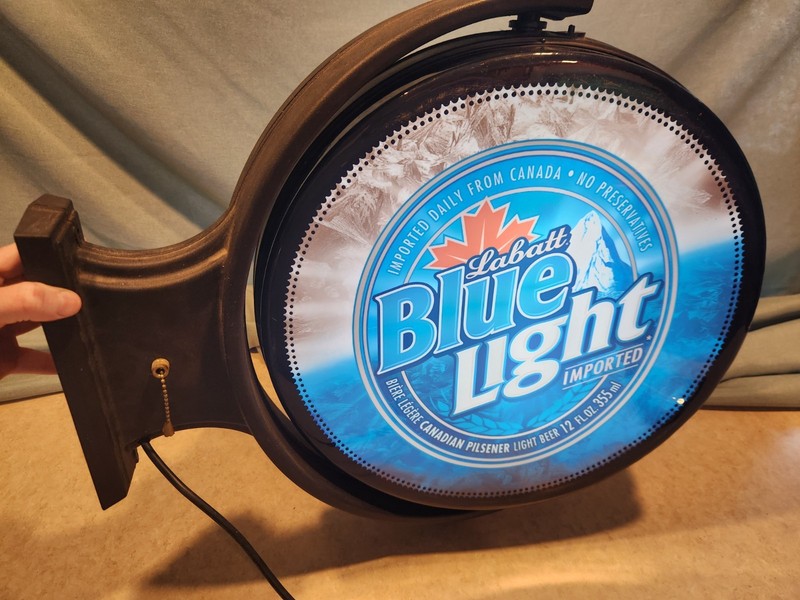 Labatt Blue Rotating Bar Light Sign 21”x 23” (lights up but does not rotate)