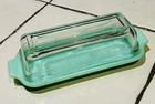 Vintage Fire King Jadite butter dish with a clear glass lid