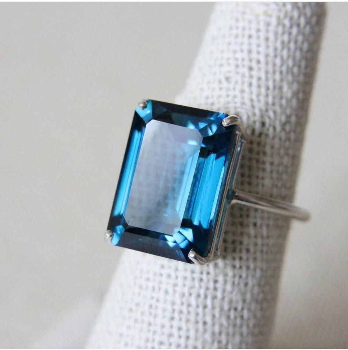 3Ct Emerald Cut Blue Topaz Engagement Ring in 14K White Gold Plated Silver