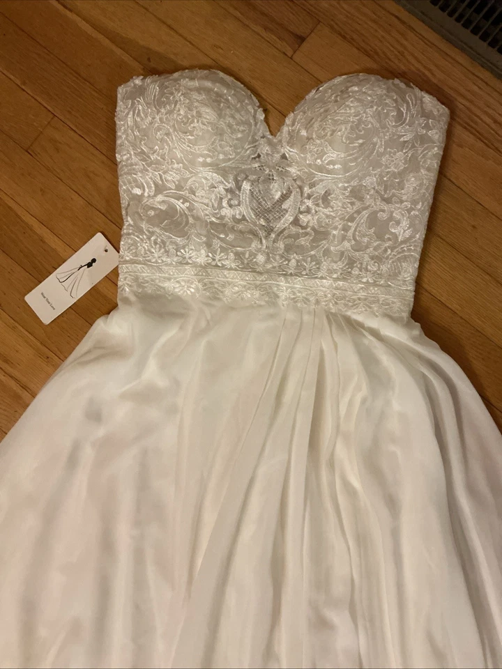 Wedding Dress Ivory Full Length With Mid Length Train. Dress Is Strapless Size 8 - Image 2 of 4
