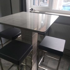  HIGH TABLE /BAR TABLE  AND 4 STOOLS,CONCRETE EFFECT AND BRUSHED STEEL