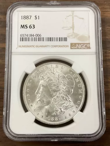 1887 $1 MORGAN SILVER DOLLAR - NGC MS63 - gold toned reverse