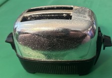 Vintage chrome pop-up toy toaster 4.5  X 2  X 2.25  