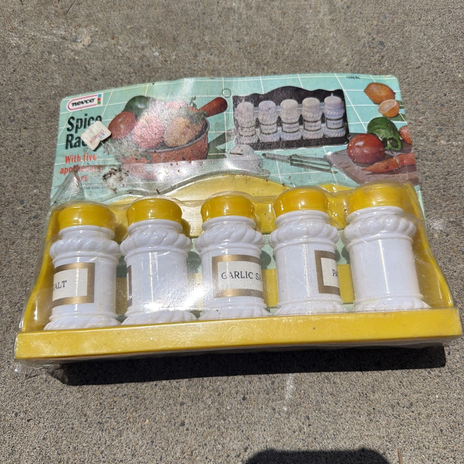 Vintage NOS Nevco Decorative Yellow Spice Rack W Plastic Jars & Labels Wrap