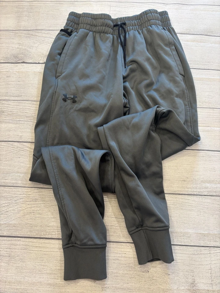 Pantalones deportivos Under Armour juveniles gris medio sueltos de vellón con puños Foto 3 de 4