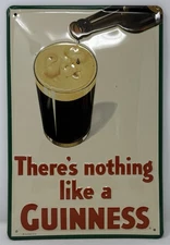 Guinness Beer “There Is Nothing Like A Guinness” Embossed Metal Tin Tacker Sign