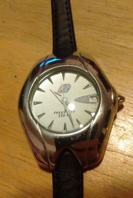 Montre Femme Vintage – Quartz Argent/Blanc – Cadran Noir 36mm – Fonctionne – Occasion