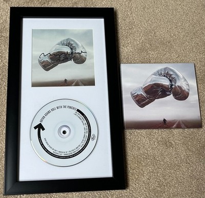BRYAN ADAMS SIGNED AUTOGRAPH ROLL WITH THE PUNCHES CD COVER FRAMED BECKETT COA