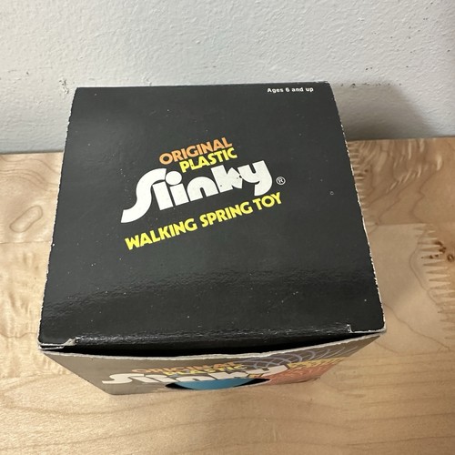 Nuevo en caja de plástico original vintage Slinky Teal James Industries NUEVO en caja original - Imagen 4 de 5