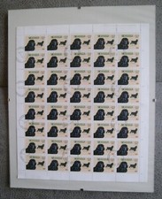 "Cocker-Spaniel" 2 versch. Briefmarkenbogen in 2 Bilderrahmen