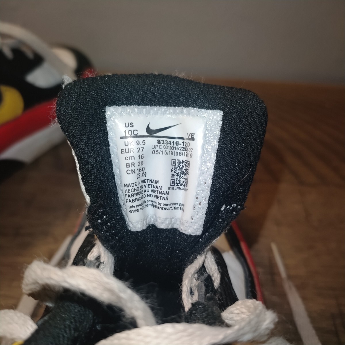 red blue white and black jordan 1s